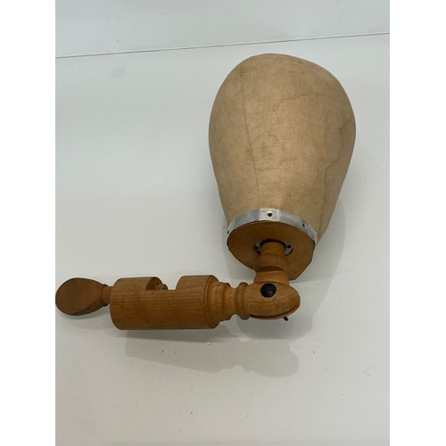 196 - A Milliners dummy head on an articulated clamp.

This lot is available for in-house packing and ship... 