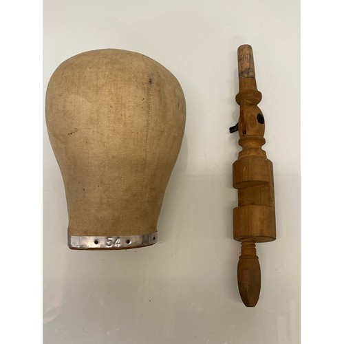 196 - A Milliners dummy head on an articulated clamp.

This lot is available for in-house packing and ship... 