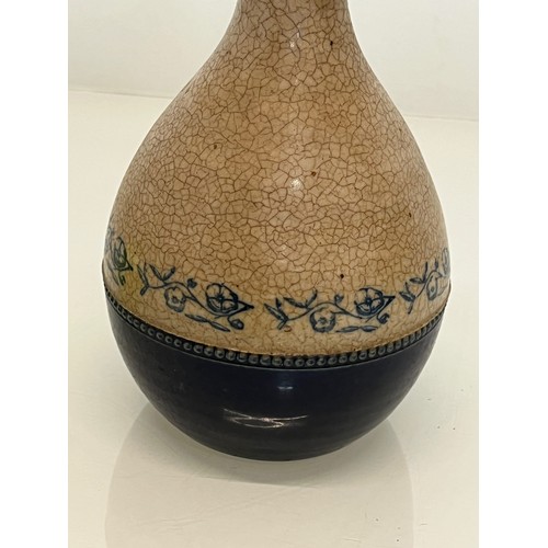 199 - Stoneware bottle with crackle glaze and hand decorated with flowers.

This lot is available for in-h... 