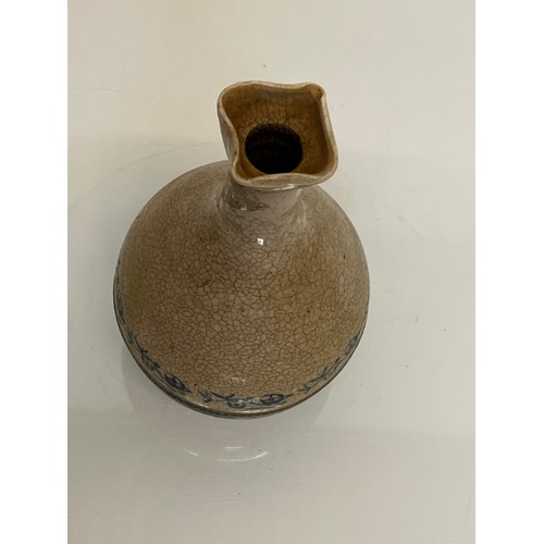 199 - Stoneware bottle with crackle glaze and hand decorated with flowers.

This lot is available for in-h... 