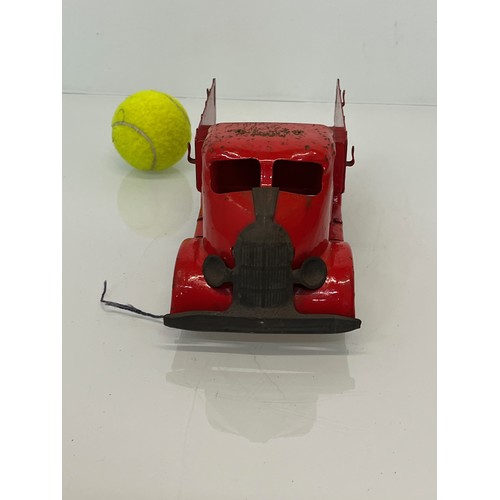 206 - Tin plate toys, an art deco streamlined truck, 27 cm long.


This lot is available for in-house pack... 