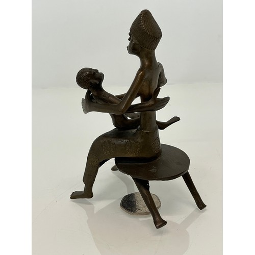 209 - African bronze figure of a mother and child. 11 cm high.


This lot is available for in-house packin... 