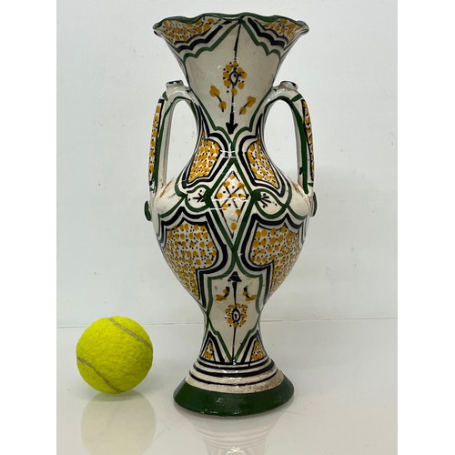 211 - Two handled studio pottery vase, early C20th. 31 cm tall.


This lot is available for in-house packi... 