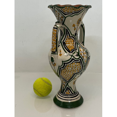 211 - Two handled studio pottery vase, early C20th. 31 cm tall.


This lot is available for in-house packi... 