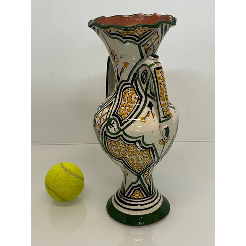 211 - Two handled studio pottery vase, early C20th. 31 cm tall.


This lot is available for in-house packi... 