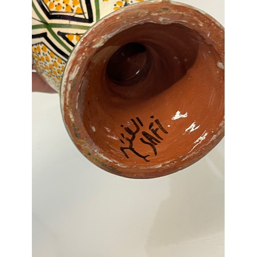 211 - Two handled studio pottery vase, early C20th. 31 cm tall.


This lot is available for in-house packi... 