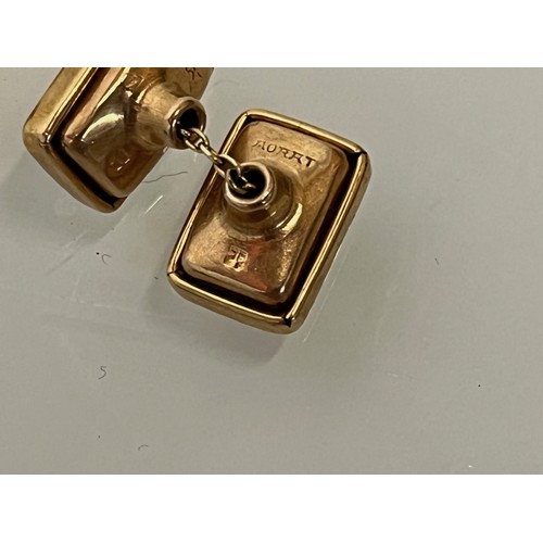 216 - A pair of gents cuff links marked to the rear.		


This lot is available for in-house packing and sh... 