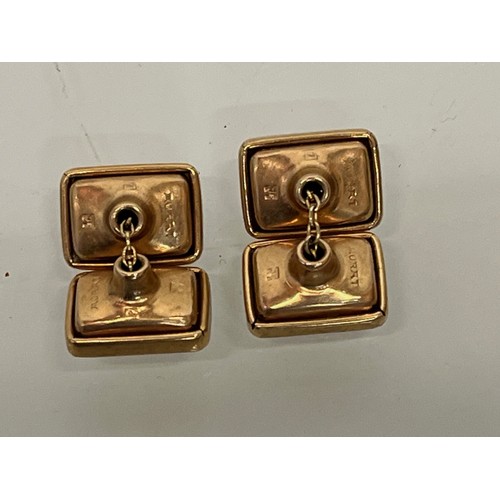 216 - A pair of gents cuff links marked to the rear.		


This lot is available for in-house packing and sh... 