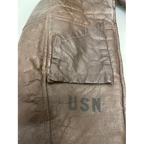 225 - Militaria, WWII American a pair of sheepskin winter flying trousers marked for USN.

Length of zip f... 