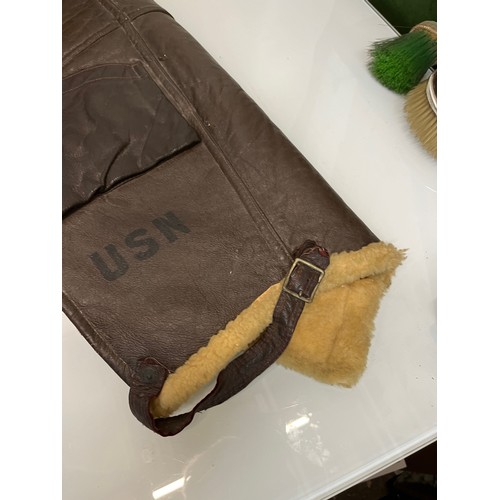 225 - Militaria, WWII American a pair of sheepskin winter flying trousers marked for USN.

Length of zip f... 