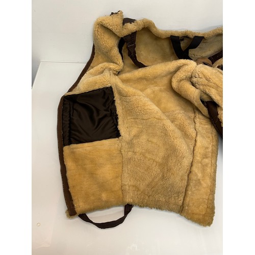 225 - Militaria, WWII American a pair of sheepskin winter flying trousers marked for USN.

Length of zip f... 