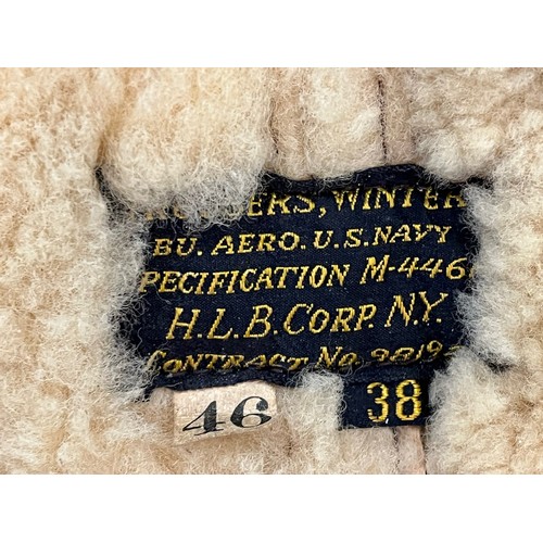 225 - Militaria, WWII American a pair of sheepskin winter flying trousers marked for USN.

Length of zip f... 