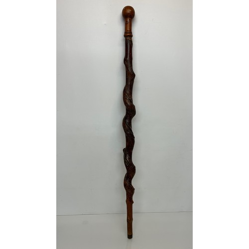 228 - Hand turned walking stick 101 cm long.

This lot is available for in-house shipping