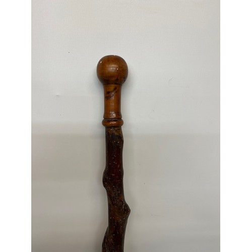 228 - Hand turned walking stick 101 cm long.

This lot is available for in-house shipping