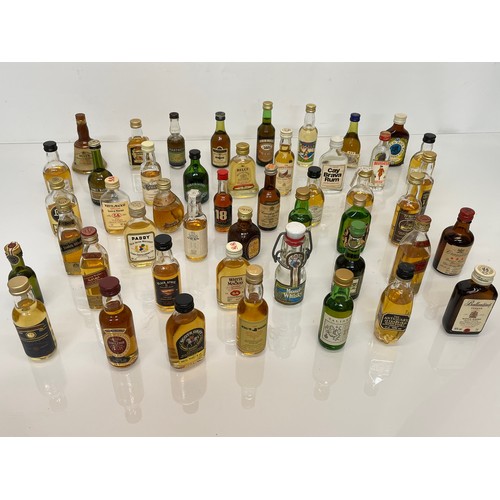 240 - Collection of miniature spirit bottles, Malt and Blended Whisky, Rum, Brandy Gin etc.

This lot is a... 