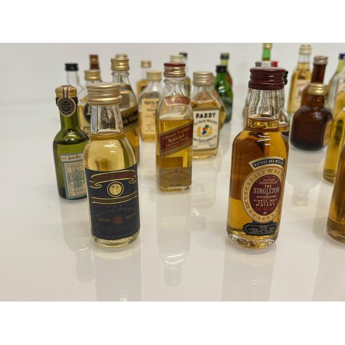 240 - Collection of miniature spirit bottles, Malt and Blended Whisky, Rum, Brandy Gin etc.

This lot is a... 