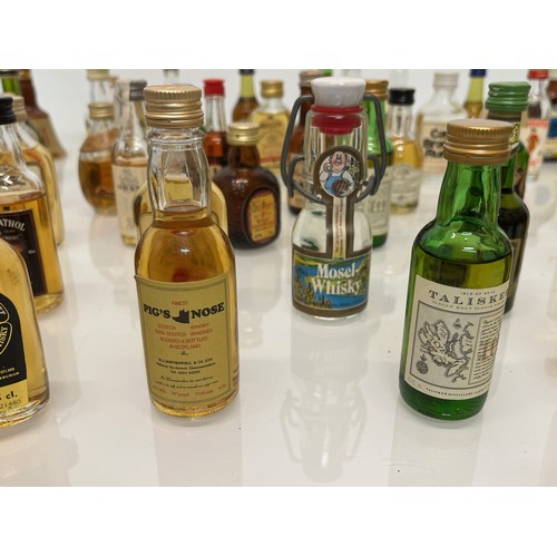 240 - Collection of miniature spirit bottles, Malt and Blended Whisky, Rum, Brandy Gin etc.

This lot is a... 