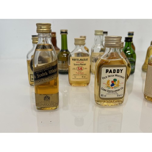 240 - Collection of miniature spirit bottles, Malt and Blended Whisky, Rum, Brandy Gin etc.

This lot is a... 