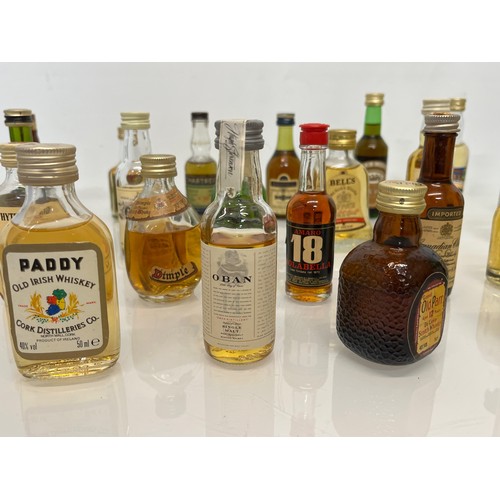 240 - Collection of miniature spirit bottles, Malt and Blended Whisky, Rum, Brandy Gin etc.

This lot is a... 