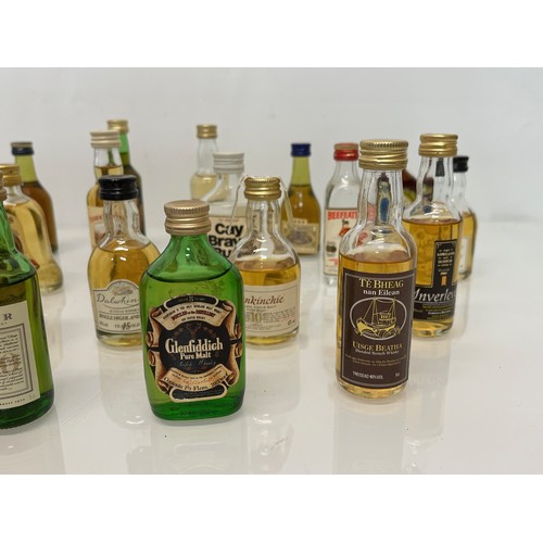 240 - Collection of miniature spirit bottles, Malt and Blended Whisky, Rum, Brandy Gin etc.

This lot is a... 