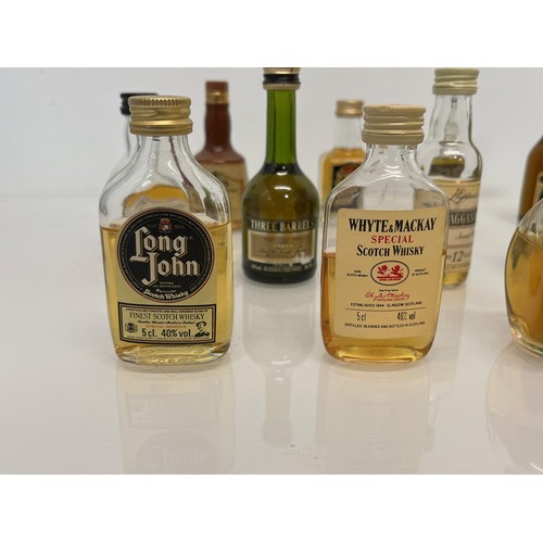 240 - Collection of miniature spirit bottles, Malt and Blended Whisky, Rum, Brandy Gin etc.

This lot is a... 