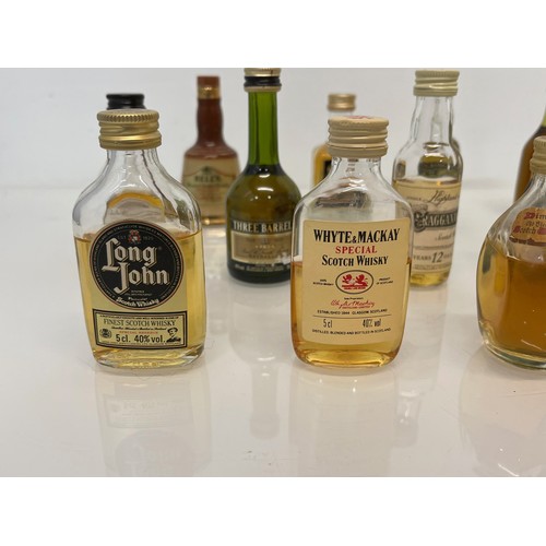 240 - Collection of miniature spirit bottles, Malt and Blended Whisky, Rum, Brandy Gin etc.

This lot is a... 