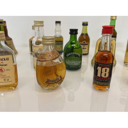 240 - Collection of miniature spirit bottles, Malt and Blended Whisky, Rum, Brandy Gin etc.

This lot is a... 