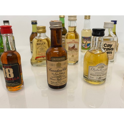 240 - Collection of miniature spirit bottles, Malt and Blended Whisky, Rum, Brandy Gin etc.

This lot is a... 