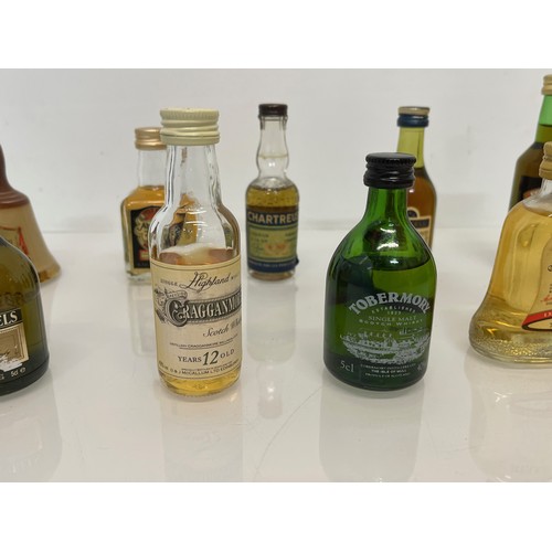 240 - Collection of miniature spirit bottles, Malt and Blended Whisky, Rum, Brandy Gin etc.

This lot is a... 