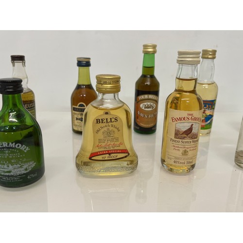 240 - Collection of miniature spirit bottles, Malt and Blended Whisky, Rum, Brandy Gin etc.

This lot is a... 