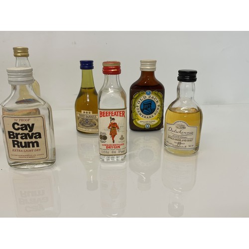 240 - Collection of miniature spirit bottles, Malt and Blended Whisky, Rum, Brandy Gin etc.

This lot is a... 