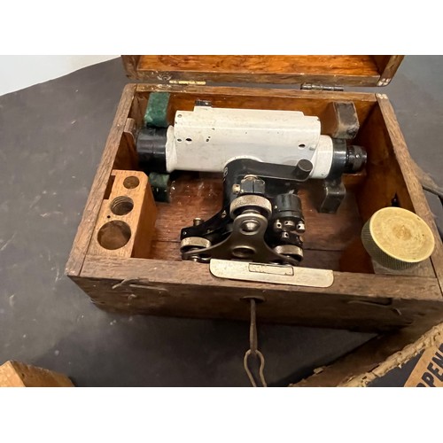 263 - Tools, a cased surveyors theodolite, a dowel drilling jig and a saw sharpener.

This lot is availabl... 