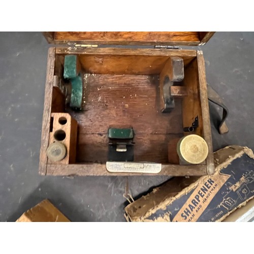 263 - Tools, a cased surveyors theodolite, a dowel drilling jig and a saw sharpener.

This lot is availabl... 