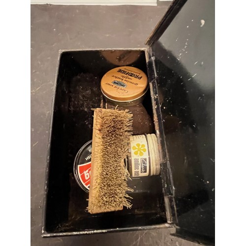 267 - A boxed Shoeshine kit in a japanned black metal box.

This lot is available for in-house packing & s... 