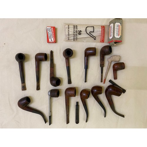 272 - A Selection of 14 vintage Pipes and Pipe Smoking Ephemera. 

Includes 12 Wooden Pipes, a Single Clay... 