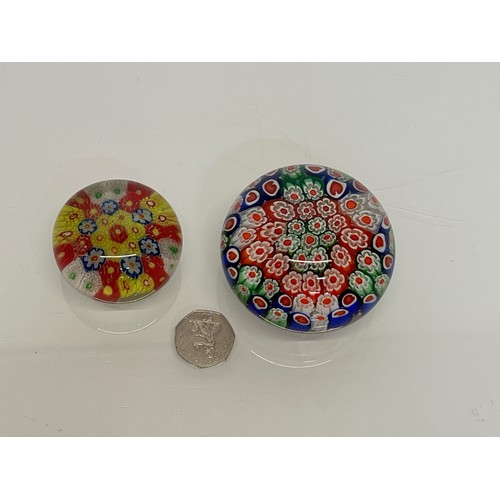 481 - Two glass paper weights.

This lot is available for in-house packing & shipping