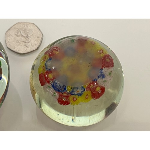 481 - Two glass paper weights.

This lot is available for in-house packing & shipping