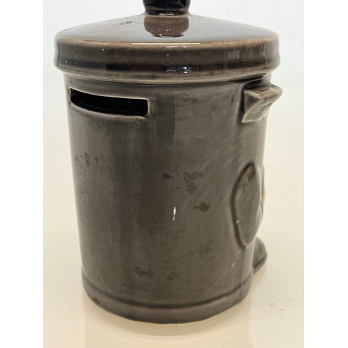 485 - A dusty Bin ceramic money box.

This lot is available for in-house packing & shipping