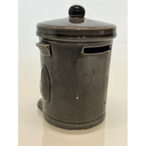 485 - A dusty Bin ceramic money box.

This lot is available for in-house packing & shipping