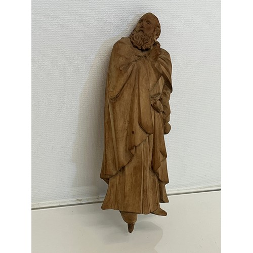 488 - A nicely detailed carved hardwood figure.


This lot is available for in-house packing & shipping