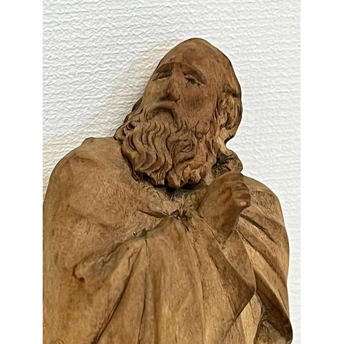 488 - A nicely detailed carved hardwood figure.


This lot is available for in-house packing & shipping