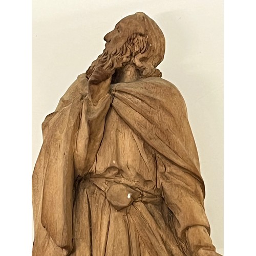 488 - A nicely detailed carved hardwood figure.


This lot is available for in-house packing & shipping