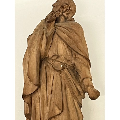 488 - A nicely detailed carved hardwood figure.


This lot is available for in-house packing & shipping