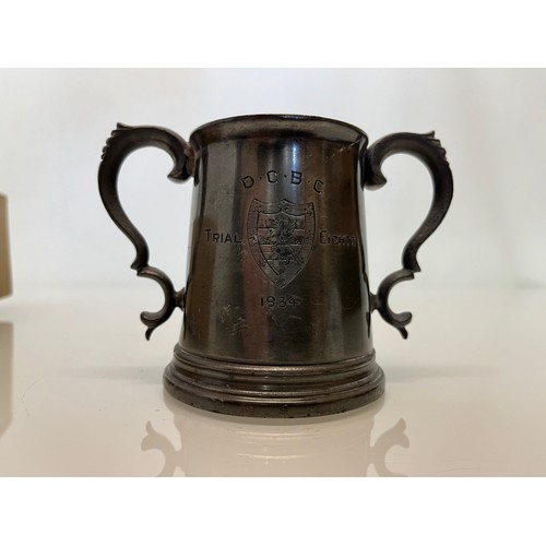 495 - University Rowing club trophy, D.C.B.C.  presentation engraved tankard from 1934, 10 cm high.

This ... 