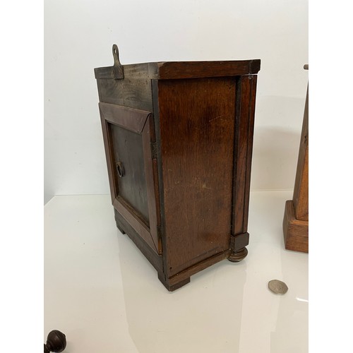 237 - Two early C20th wooden cased mantle clocks.

This lot is available for in-house shipping