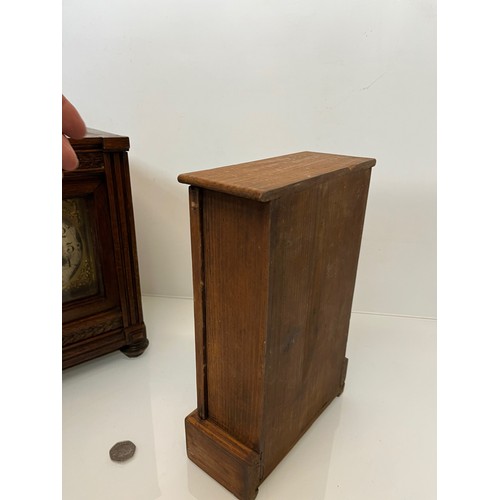 237 - Two early C20th wooden cased mantle clocks.

This lot is available for in-house shipping