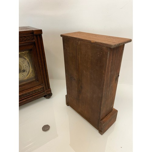 237 - Two early C20th wooden cased mantle clocks.

This lot is available for in-house shipping