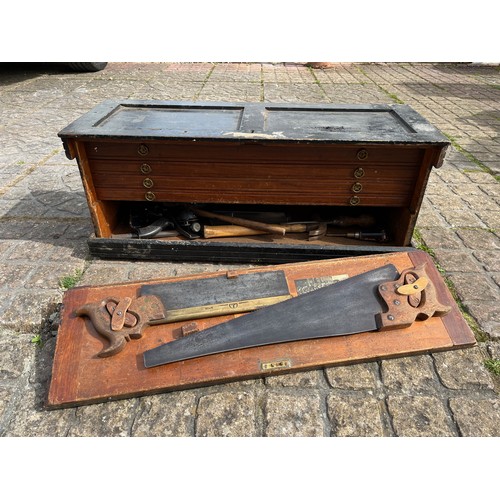 Tools, an unusual drop front tool box with planes chisels and saws inside. This lot is collecrtion