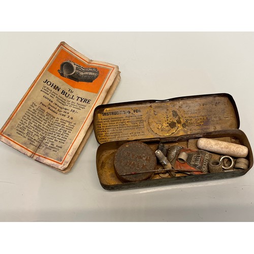 259 - Automobilia, John Bull advertising tins, man cave sign log book and a promotional gift demonstrating... 