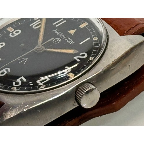 10 - A Gents military issue wristwatch by Hamilton.

This lot is available for in-house shipping